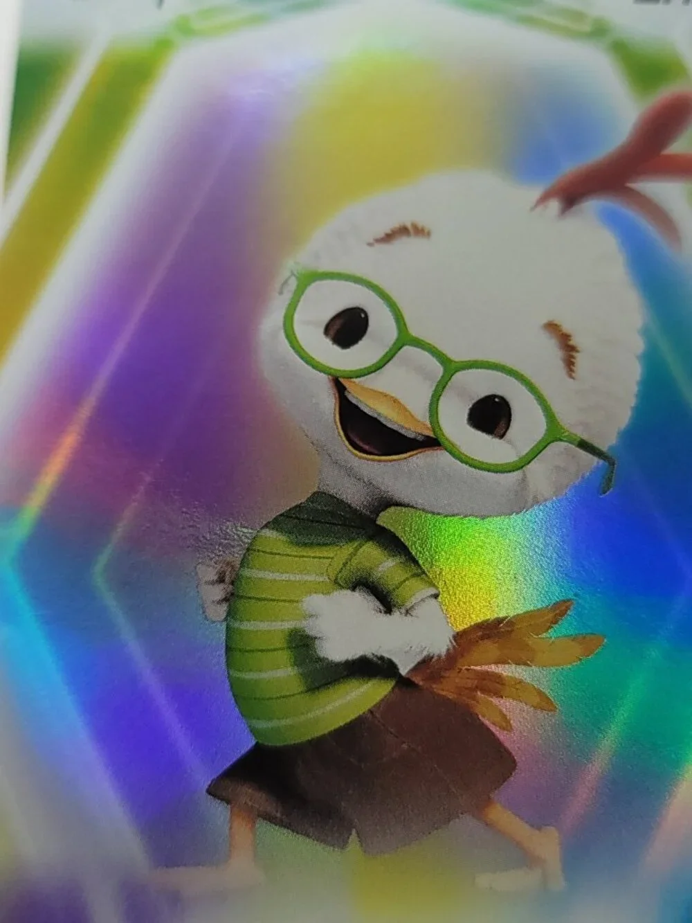 Chicken Little Topps 2026 Disney Neon Holo Parallel Refractor Limited 27/99 - Picture 2 of 4